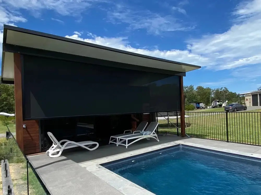 Motorised zip-blind shading a poolside cabana, Dam Good Patios